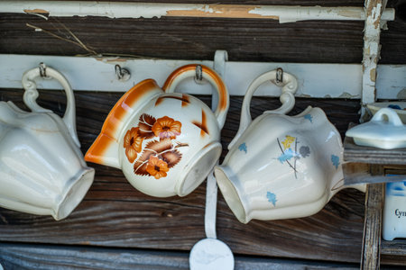 Ceramic tableware on a shelf in a restaurant. Vintage styleの写真素材
