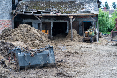 Abandoned house in the countryside. Old house with a broken roof.の写真素材