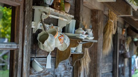 Traditional Polish porcelain utensils hanging on the wall.の写真素材