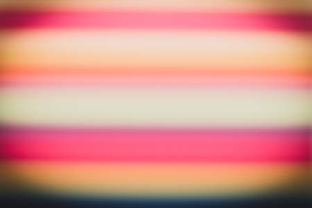 Abstract background from many multi-color straws making striped.