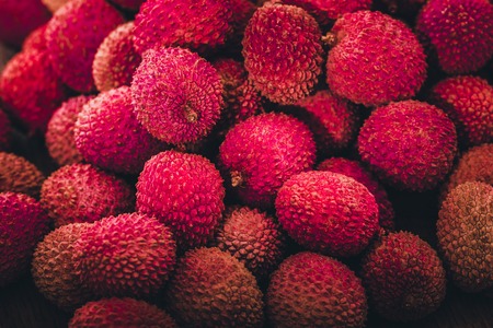 Fresh lychee on a wooden backgroundの写真素材