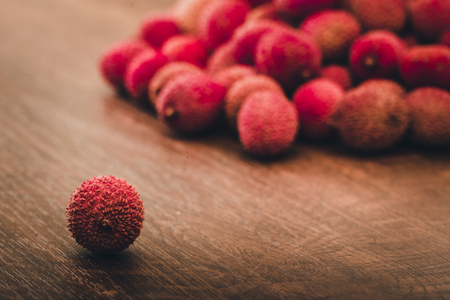 Fresh lychee on a wooden backgroundの写真素材