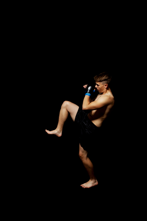 Teenager boxing in studio.の写真素材