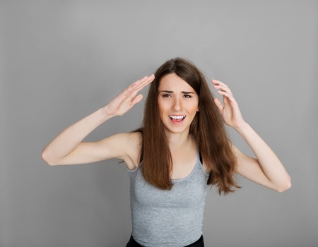 Teenage girl screamingの写真素材