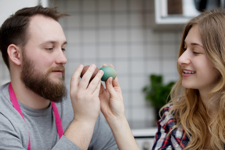 Cracking Colored Easter Eggsの写真素材