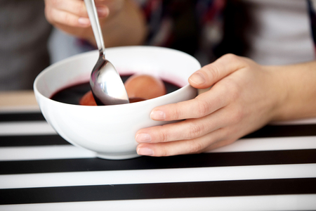 Couple together decorate eggsの写真素材