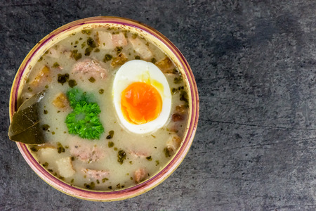 Zurek - polish Easter soup with eggs and white sausage - closeup - copy spaceの写真素材