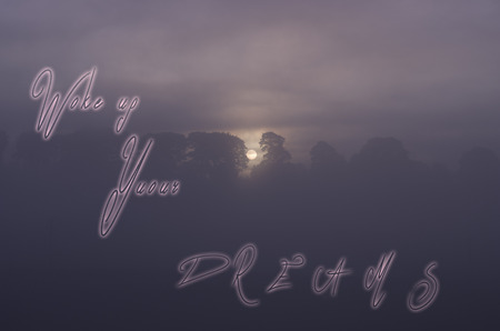 Sentence Wake up your dreams handwritten on sunsets morning background.