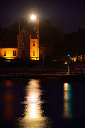 Lighthouse in Ustka ar night, Poland, Baltic sea.の写真素材