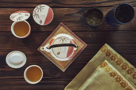 Japanese tea on wood table in top viewの写真素材