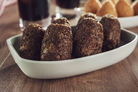 Brazilian appetiser deep fried kibbeh (Middle Eastern minced meat and bulghur fried snack)