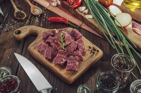 Cutted raw beef rump tail with ingredientsの写真素材