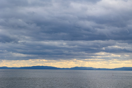 Clouds in the sky over the sea, view from the boatの写真素材