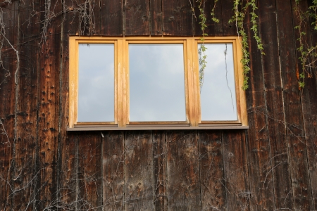 window of the old rustic houseの写真素材
