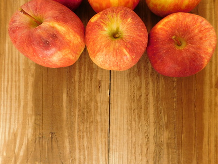 apples on wooden base