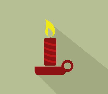 Christmas candle icon illustrated in flat designの写真素材
