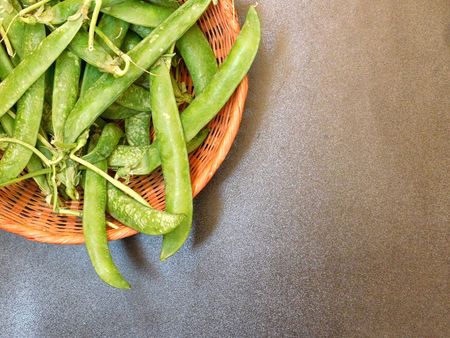 Peas on wooden backgroundの写真素材