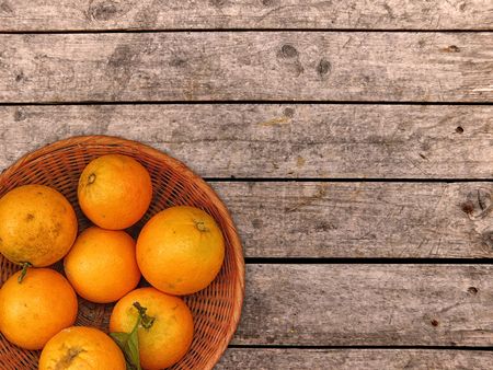 Oranges on wooden backgroundの写真素材