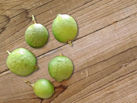 Lemons on a wooden backgroundの写真素材