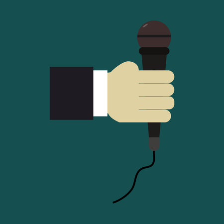 Microphone in hand. Flat design style. Vector illustration on green background.のイラスト素材