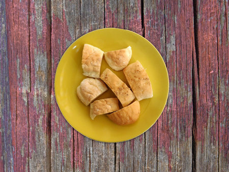 Bread on wooden background