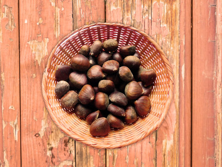 Chestnuts On The Wooden Backgroundの写真素材
