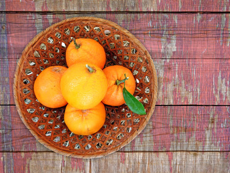 oranges on wooden backgroundの写真素材