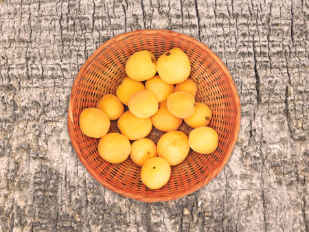 Apricots On The Wooden Backgroundの写真素材