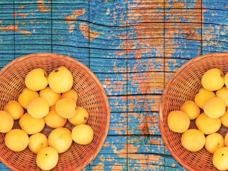 Apricots On The Wooden Backgroundの写真素材