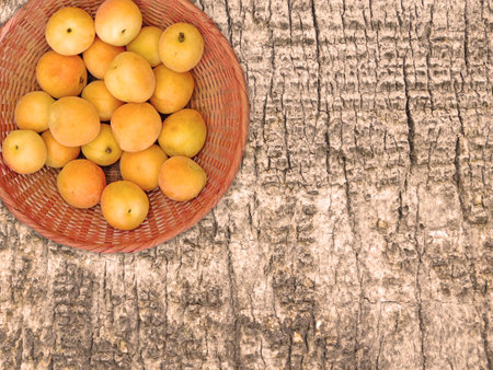 Apricots On The Wooden Backgroundの写真素材