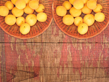 Apricots On The Wooden Backgroundの写真素材