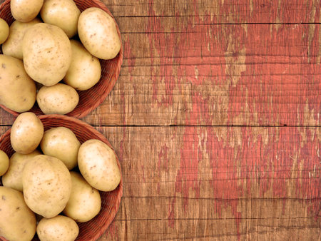 Potatoes On The Wooden Backgroundの写真素材