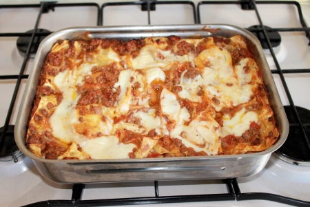 italian lasagna on a square plateの写真素材