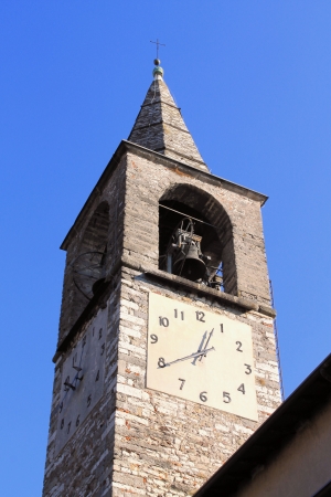 old bell tower with clockの写真素材