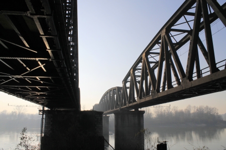 modern iron bridge over the river