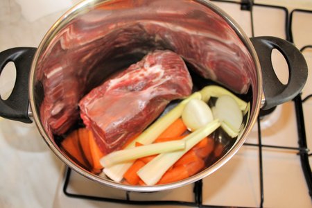 pot with beef, carrots, celery and onionの写真素材