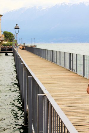 promenade in Gargnano on Garda lake in northern Italyの写真素材
