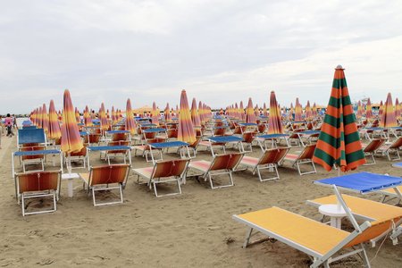 beach with umbrellas and sunbeds in Gatteo in Italyのeditorial素材