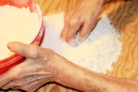 cooking fresh homemade pasta with egg and flourの写真素材