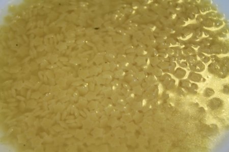 Italian soup with broth and pastaの写真素材