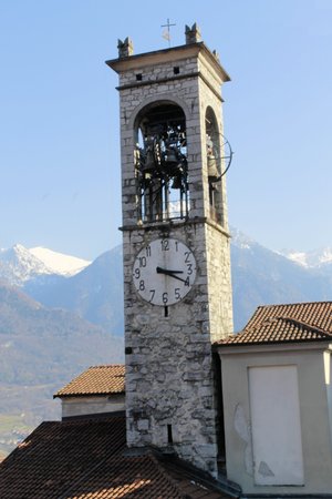 ancient bell tower of a church in Camonica Valley in northern Italyの写真素材