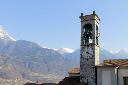 ancient bell tower of a church in Camonica Valley in northern Italyの写真素材