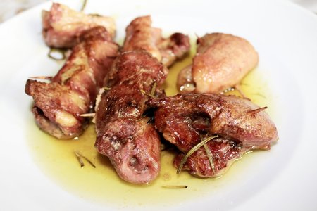 roast meat with rosemary and sage  in the plateの写真素材