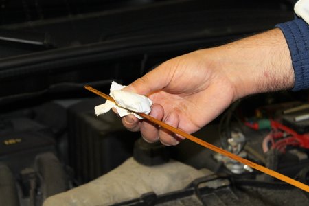 Car mechanic repairs a motor vehicleの写真素材