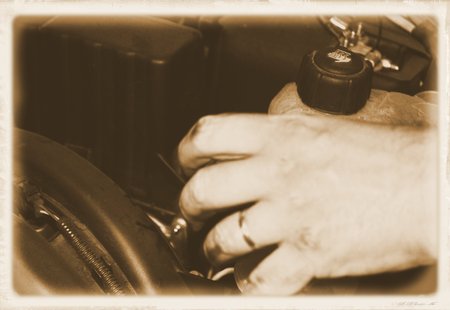 Car mechanic repairs a motor vehicleの写真素材