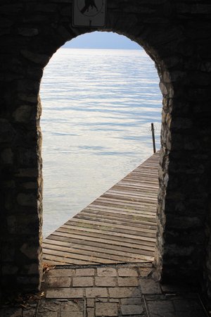 Ancient stone door on Garda lake in northern Italyの写真素材