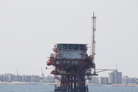 Offshore oil and gas drilling rigs working on new wellhead remote platform for oil and gas exploration and productionのeditorial素材