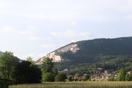 landscape with meadow and mountains in northern Italy