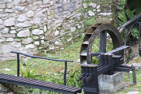 Wooden upper wheels with blades of an old watermillの写真素材