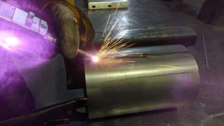 Welding metal with sparks flying in the air. High quality photo